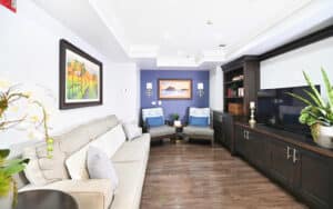 Mclure recreation room, elegantly decorated with modern furniture and electronics